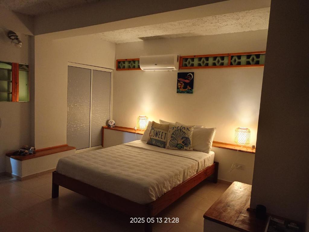 Postel nebo postele na pokoji v ubytování Posada Refugio de la Luna