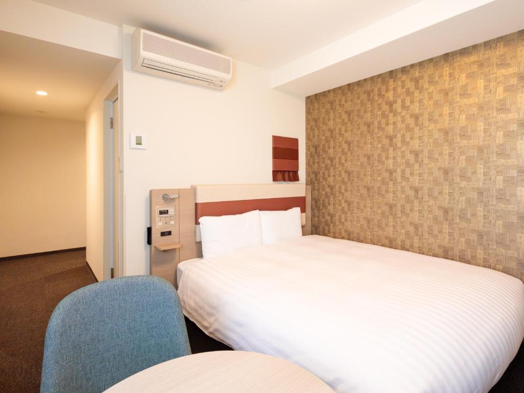 Postel nebo postele na pokoji v ubytování Comfort Hotel ERA Ise