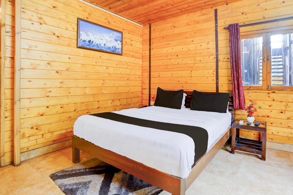Postel nebo postele na pokoji v ubytování Super Townhouse Morjim