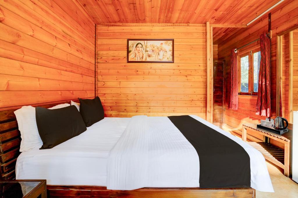 Postel nebo postele na pokoji v ubytování Super Townhouse Morjim