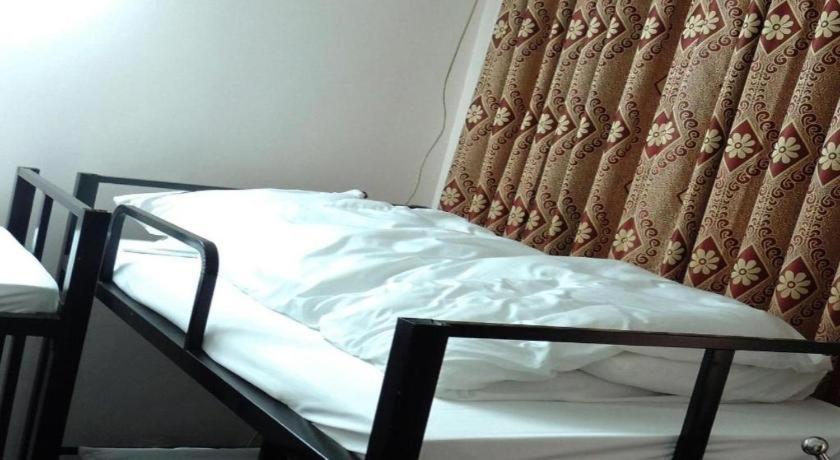 Postel nebo postele na pokoji v ubytování Halong Happy Hostel