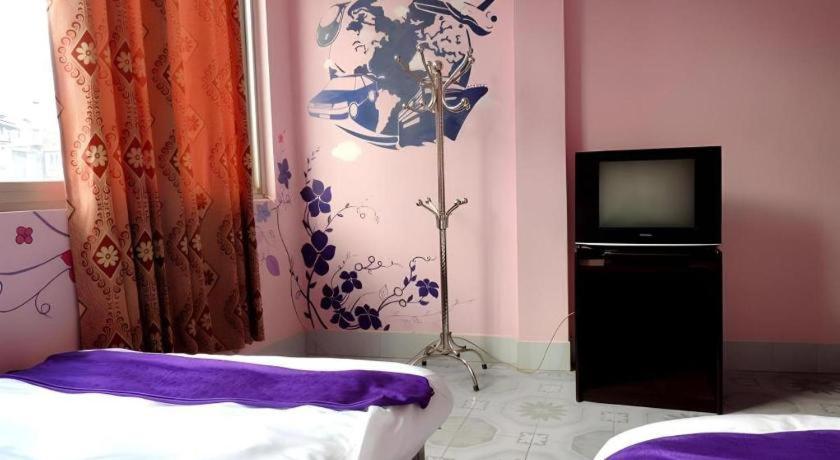 Postel nebo postele na pokoji v ubytování Halong Happy Hostel