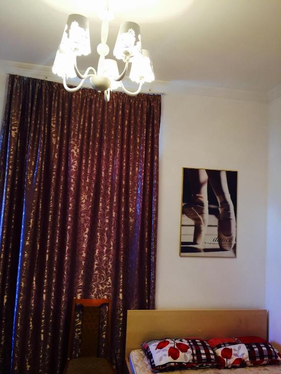 Postel nebo postele na pokoji v ubytování GuestHouse Natali