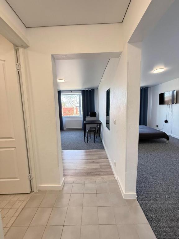 Postel nebo postele na pokoji v ubytování Kivi Apartments