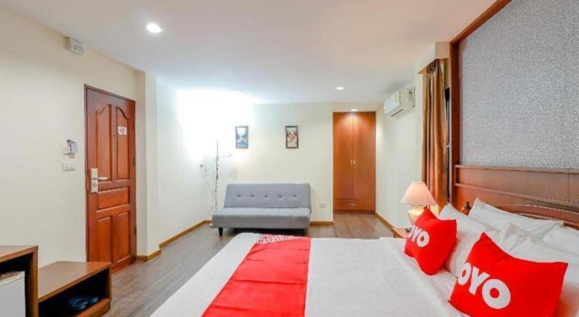 Postel nebo postele na pokoji v ubytování Tong House Resort