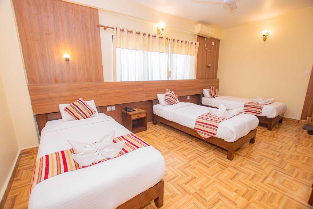 Letto o letti in una camera di Hotel Crystal Palace