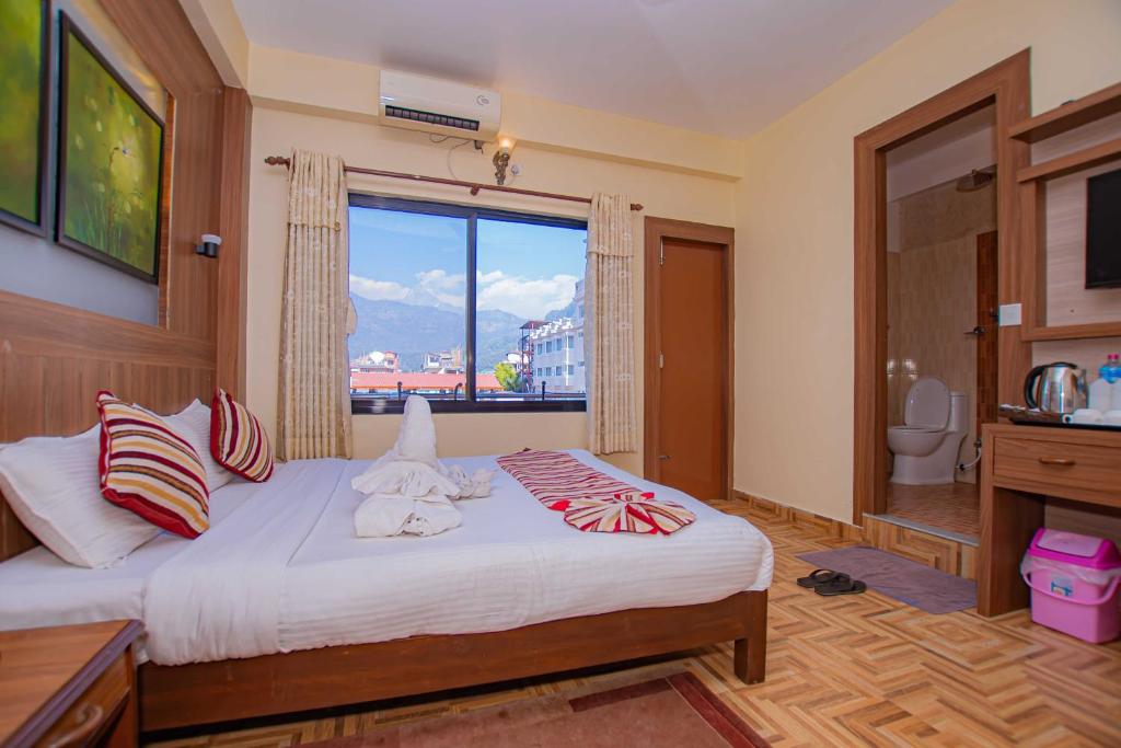 Letto o letti in una camera di Hotel Crystal Palace