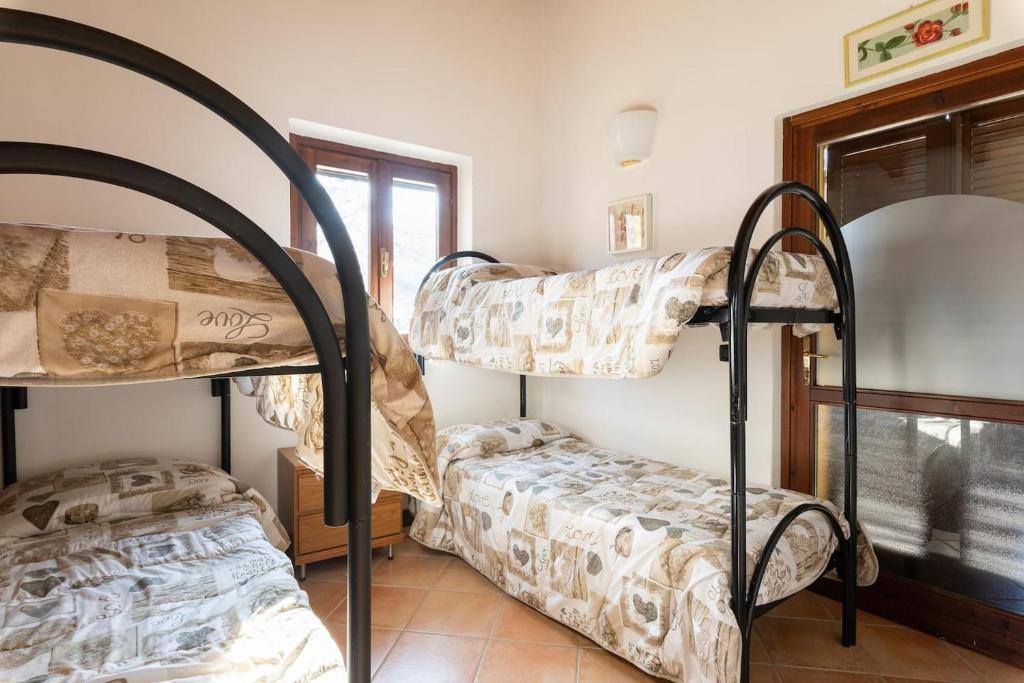 Posteľ alebo postele v izbe v ubytovaní Tenuta MonteOliveto - Classic Cottage XL - Agriturismo nelle Langhe