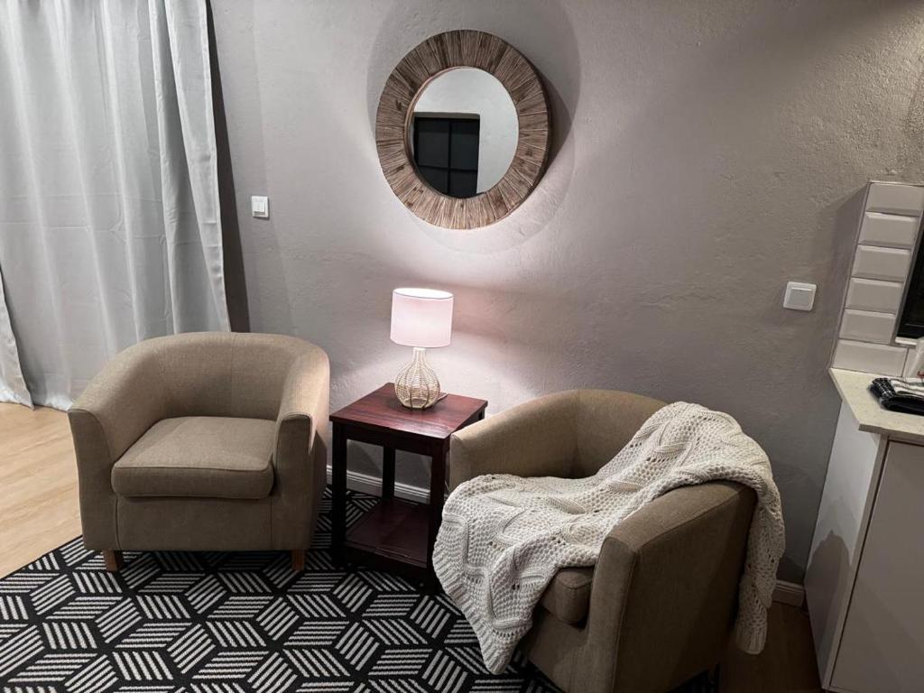 Predel za sedenje v nastanitvi Sunset Field Guest Flat