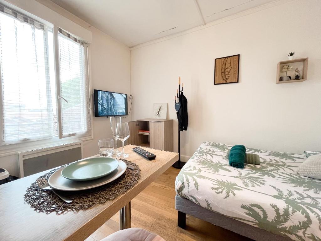 Postel nebo postele na pokoji v ubytování Balade à Montluçon