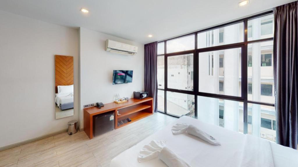 Giường trong phòng chung tại INBED