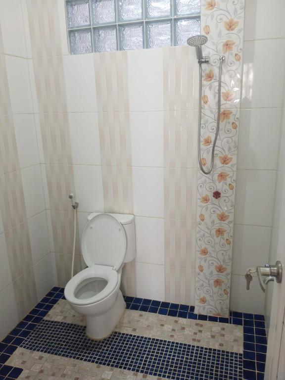 Koupelna v ubytování Mutun House