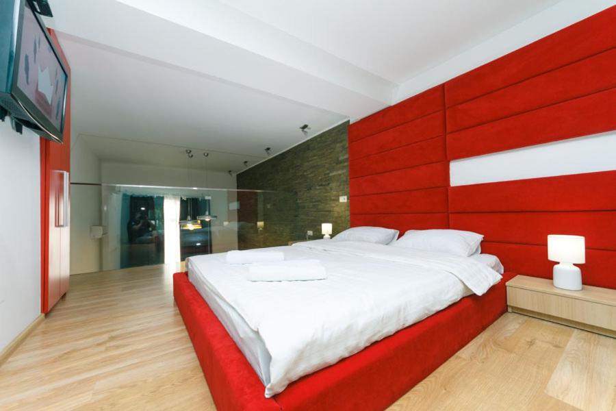 En eller flere senge i et værelse på Лофт на Майдані Крещатик