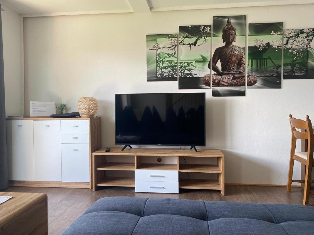 Televízia a/alebo spoločenská miestnosť v ubytovaní Haus Kampl - Appartement Grundlsee