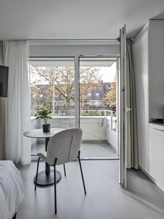 TV a/nebo společenská místnost v ubytování MOOI Apartments Grenchen