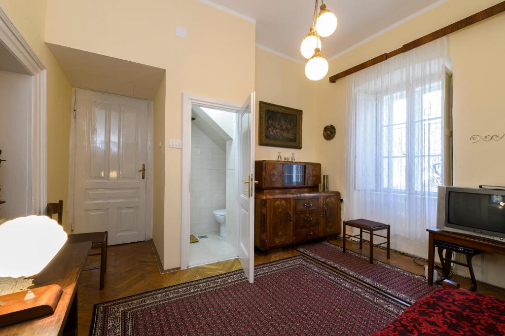TV a/nebo společenská místnost v ubytování La Vecchia Casa