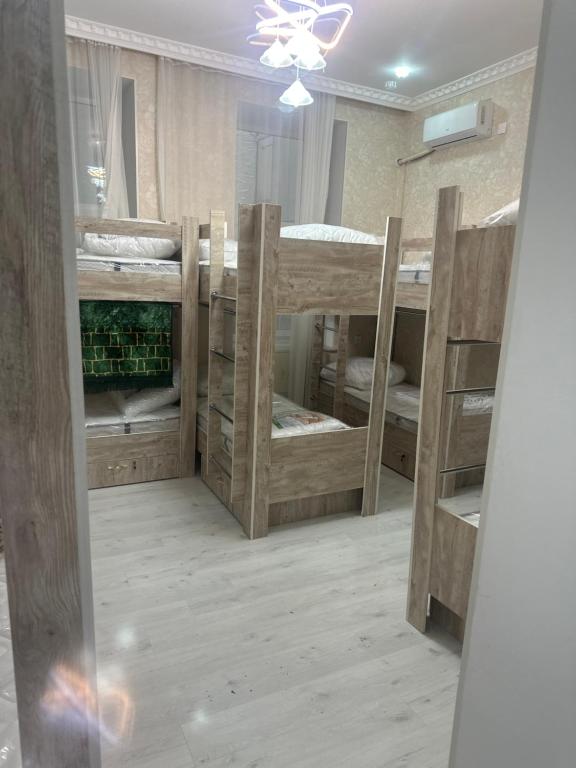 Postel nebo postele na pokoji v ubytování MI Hostel