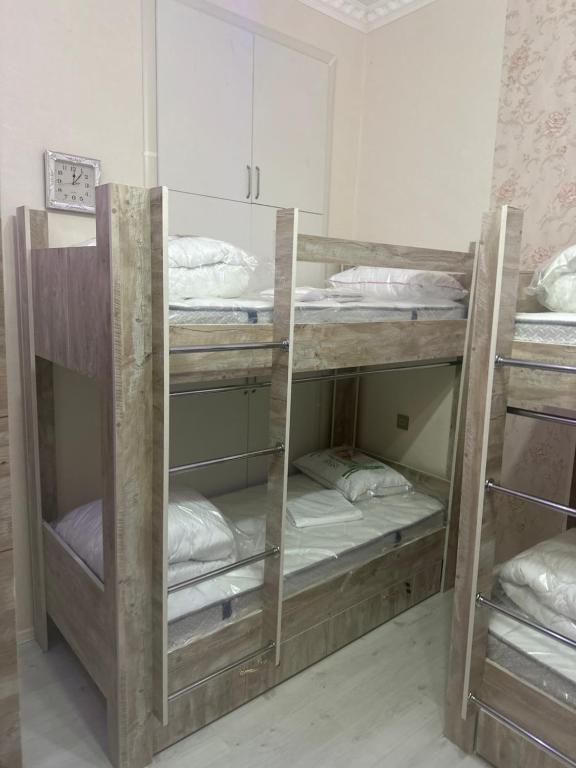 Postel nebo postele na pokoji v ubytování MI Hostel