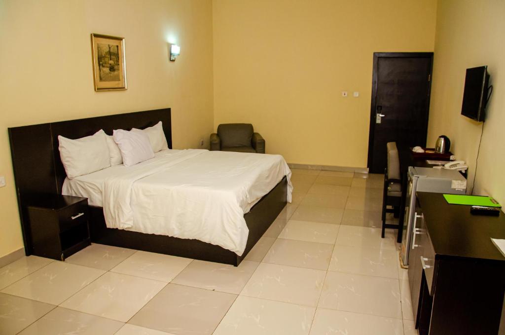 Postel nebo postele na pokoji v ubytování Fabian Hotel Ado-Ekiti
