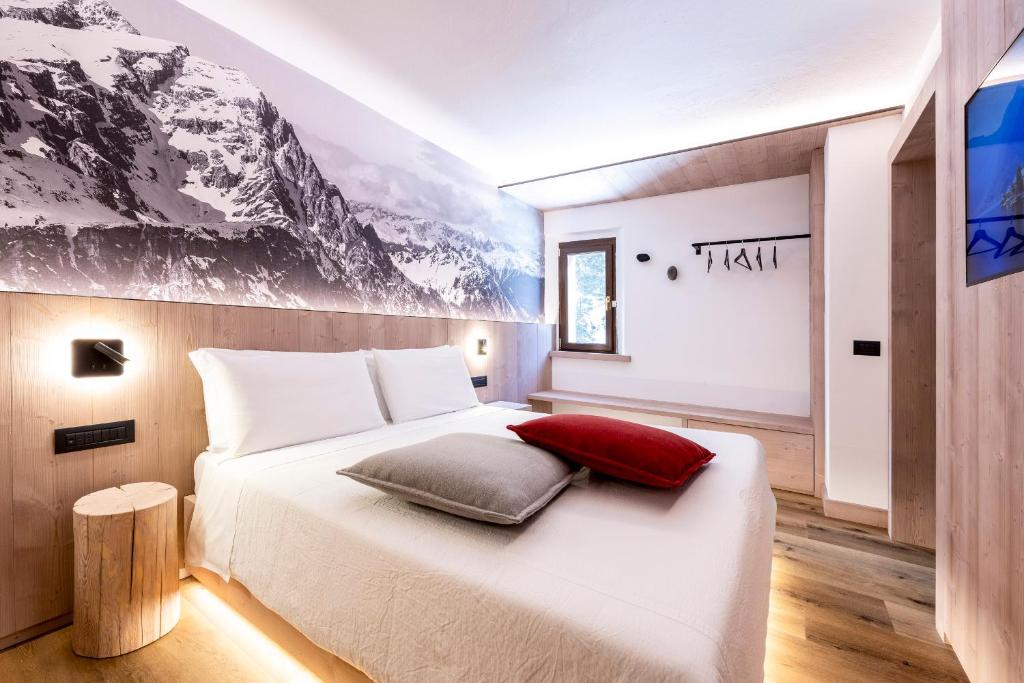 Postel nebo postele na pokoji v ubytování Hotel Miralago