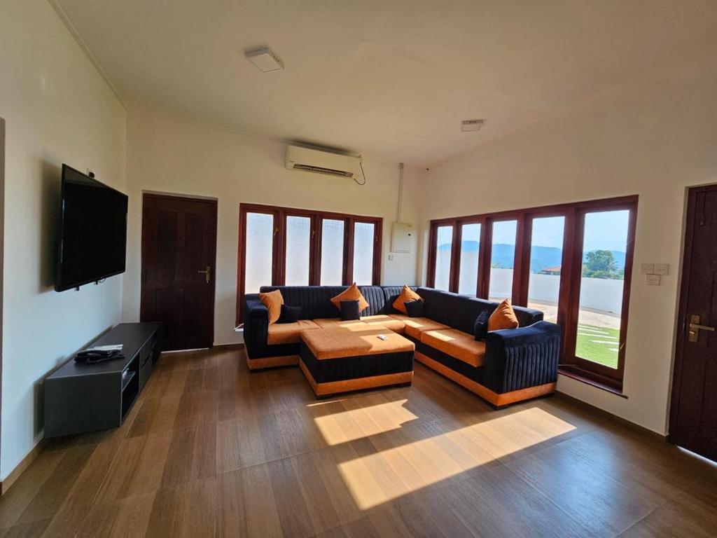 Posezení v ubytování Alpha Bungalow - Kandy