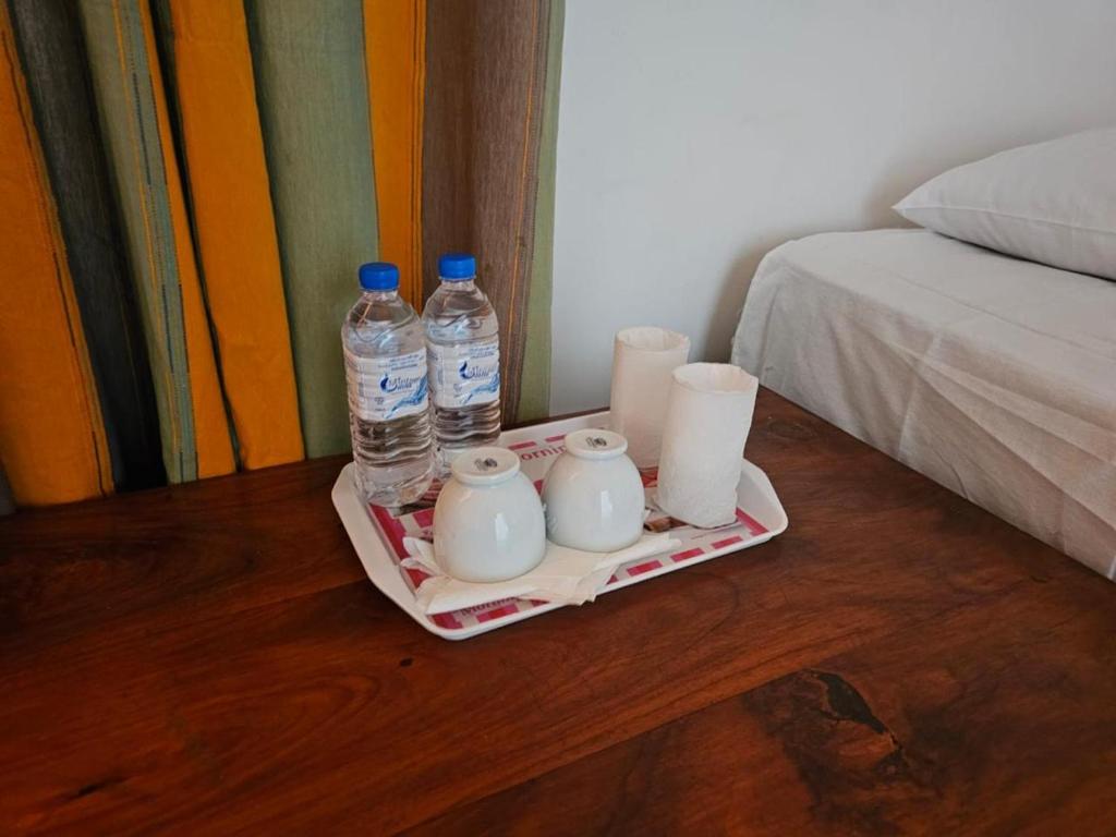 Postel nebo postele na pokoji v ubytování Alpha Bungalow - Kandy