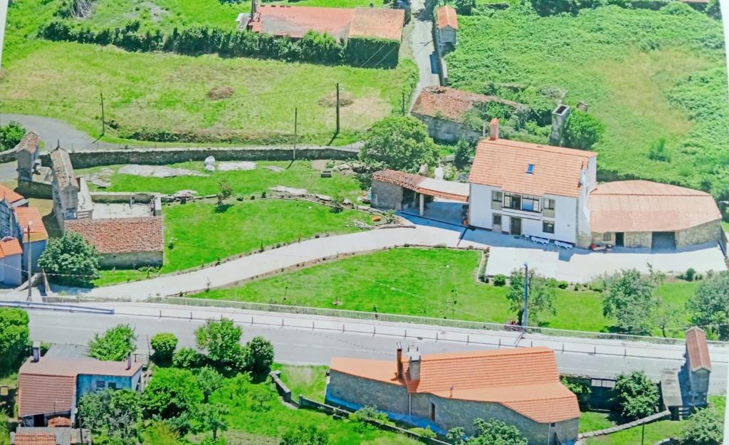 an aerial view of a house and a road at Casa Rioboo -Tranquilidad y descanso en Laxe in Laxe