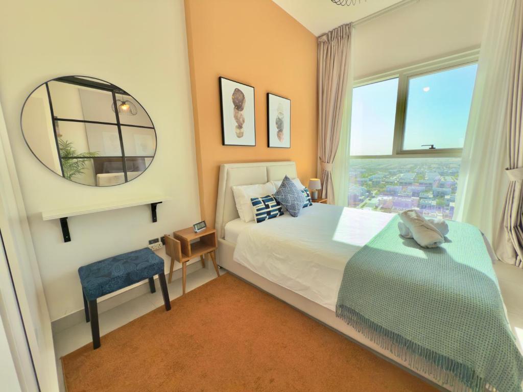 Postel nebo postele na pokoji v ubytování Modern flat in Dubai Hills
