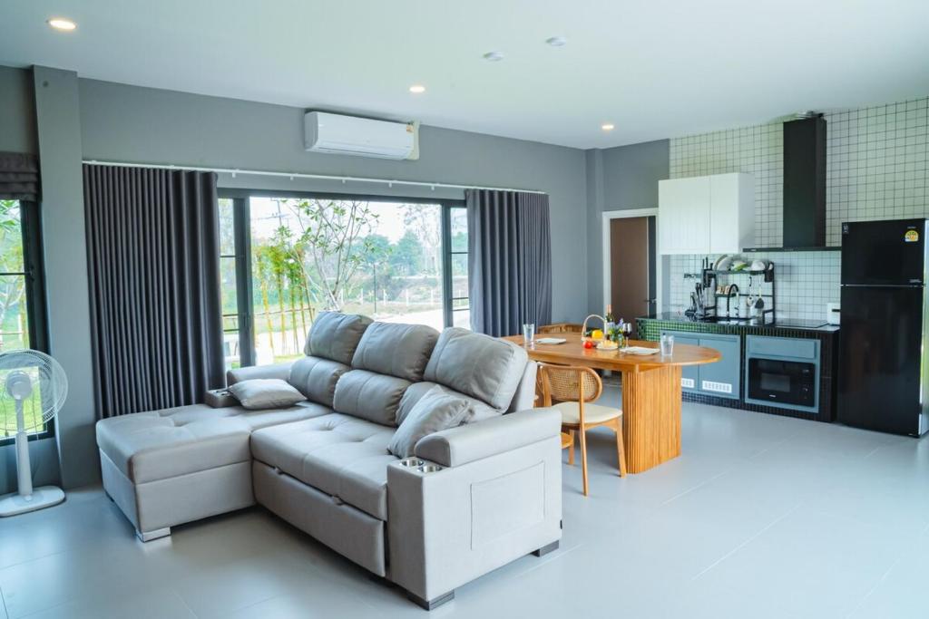 Kuchyň nebo kuchyňský kout v ubytování Kirin's House Mae Taeng Chiangmai