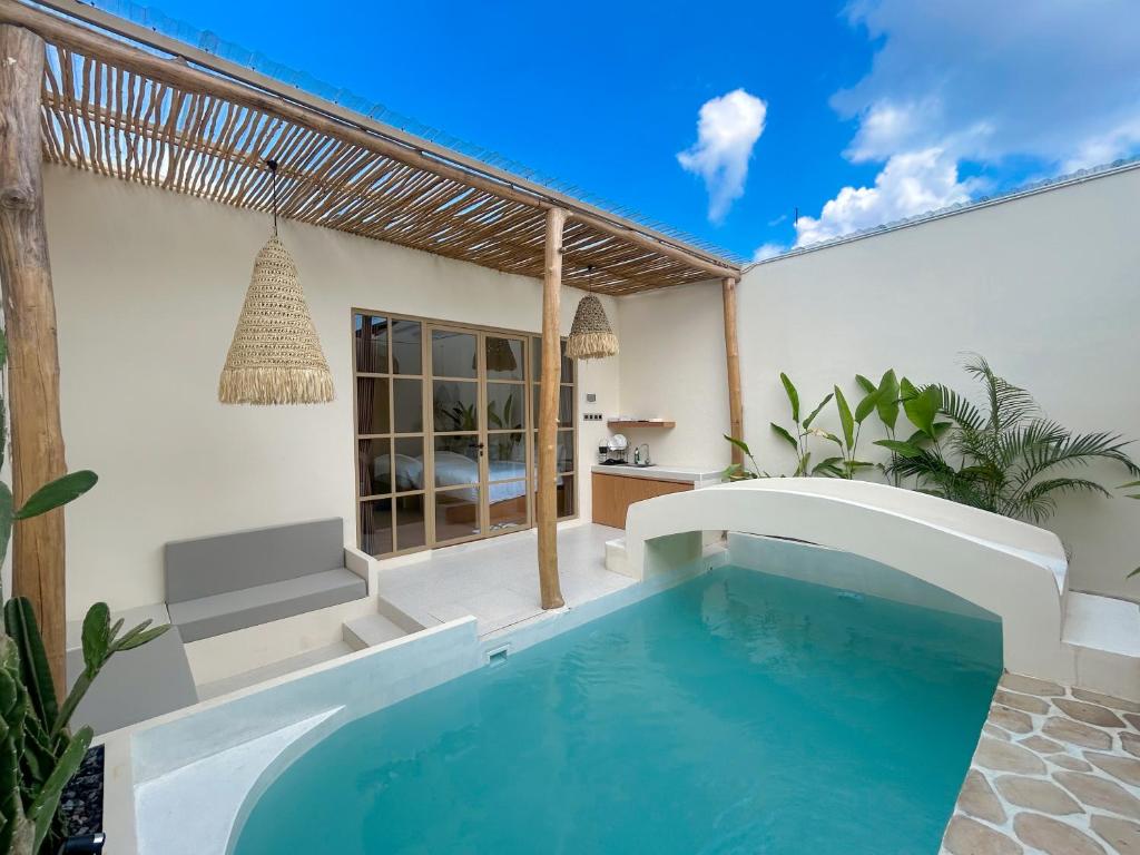 Bazén v ubytování Tujuan Jogja Villas - Kresna nebo v jeho okolí
