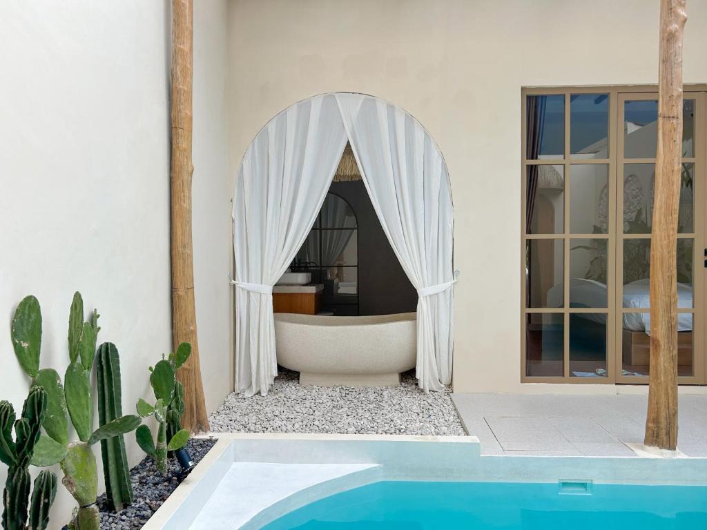 Bazén v ubytování Tujuan Jogja Villas - Kresna nebo v jeho okolí