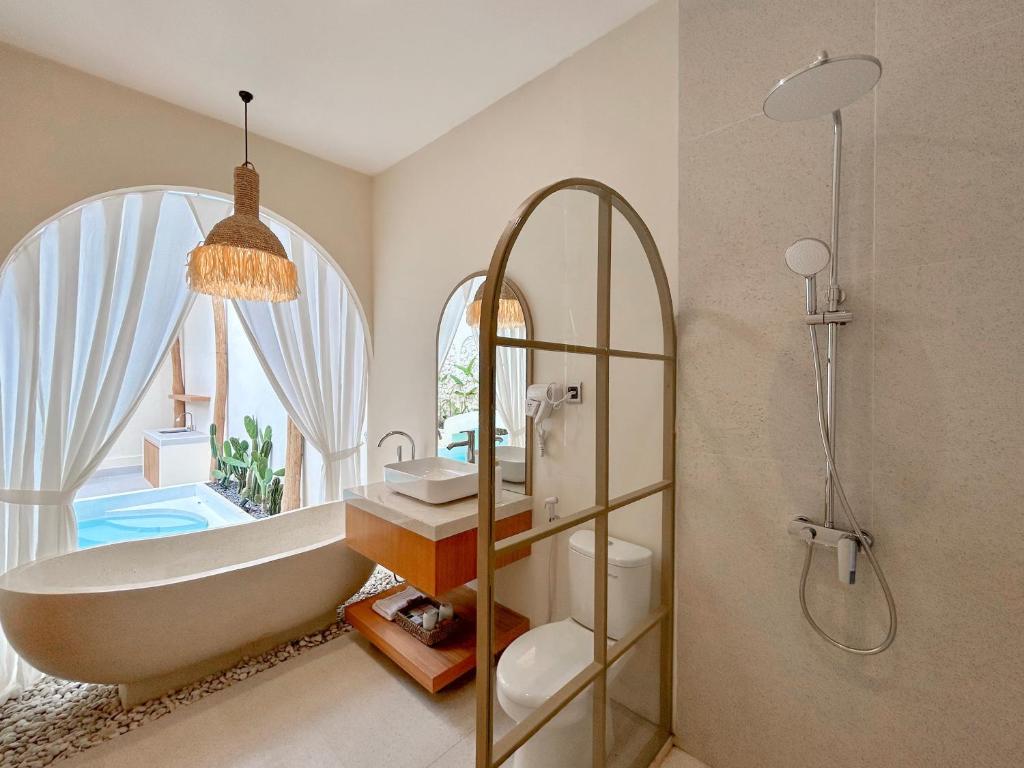 Koupelna v ubytování Tujuan Jogja Villas - Kresna