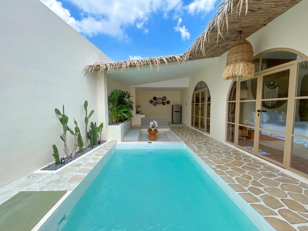 Bazén v ubytování Tujuan Jogja Villas - Kresna nebo v jeho okolí