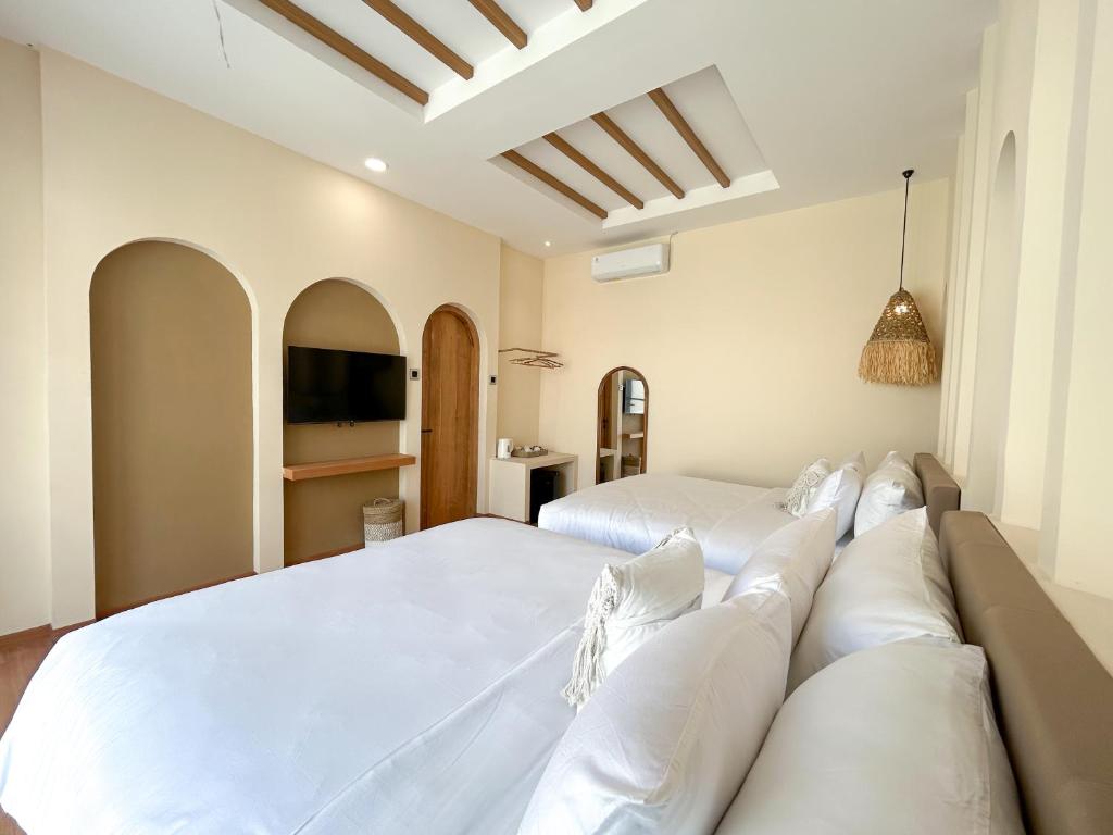 TV a/nebo společenská místnost v ubytování Tujuan Jogja Villas - Kresna