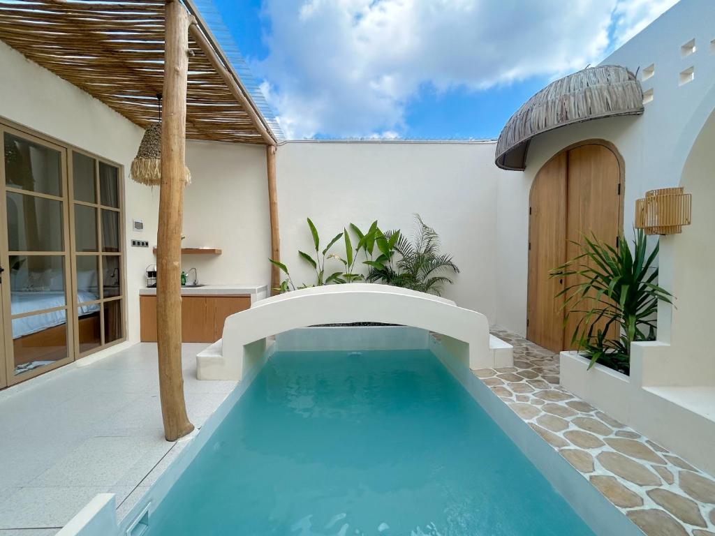 Bazén v ubytování Tujuan Jogja Villas - Kresna nebo v jeho okolí