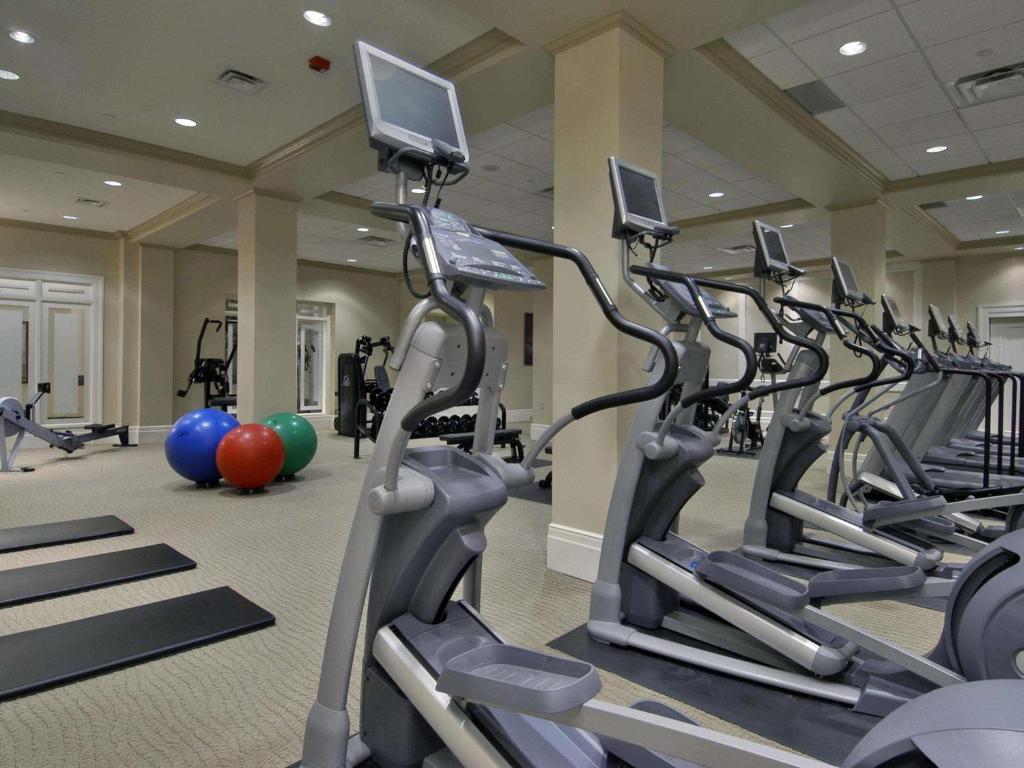 a gym with several tread machines in a row at Fairmont Chateau Laurier in Ottawa