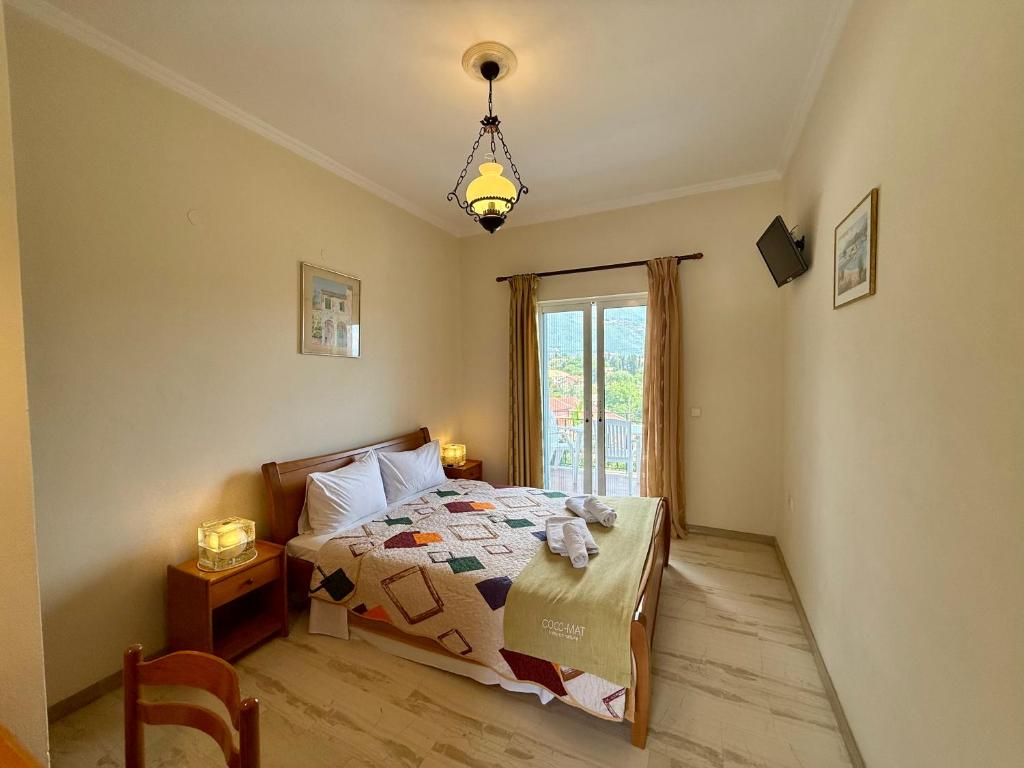 Postel nebo postele na pokoji v ubytování Thomas Apartments