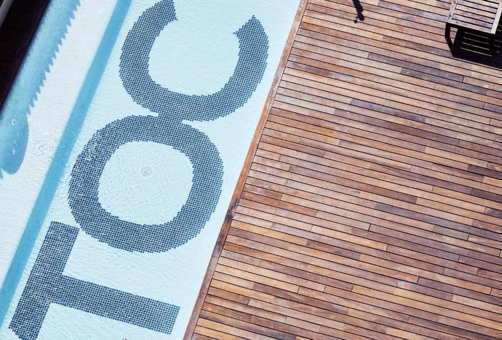 a number on the side of a swimming pool at TOC Hostel Barcelona in Barcelona