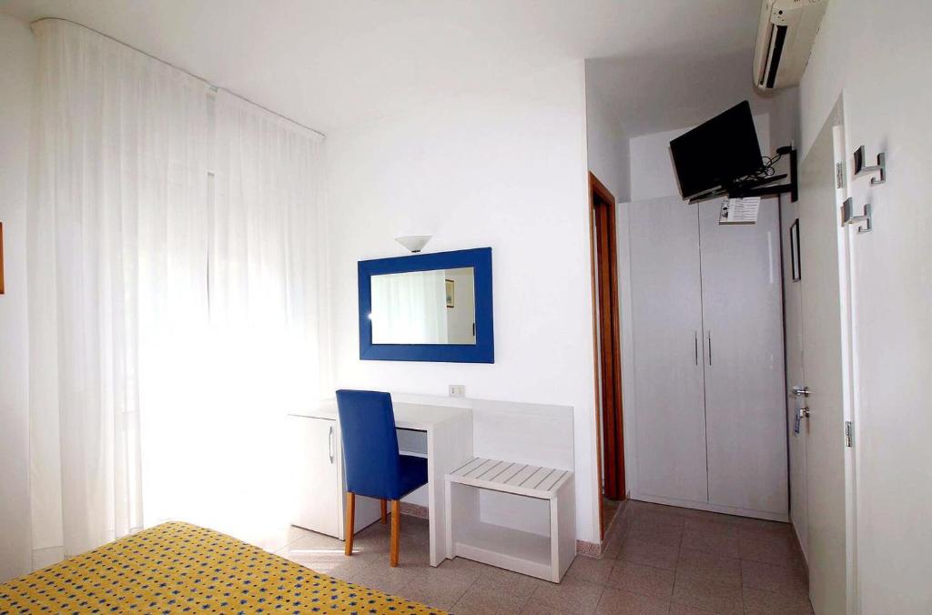 TV a/nebo společenská místnost v ubytování Hotel Eraclea