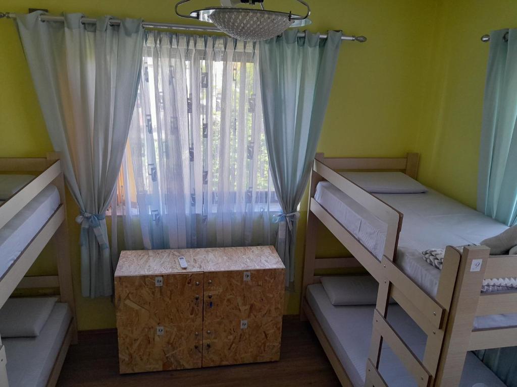 Letto o letti in una camera di Blissful Hostel