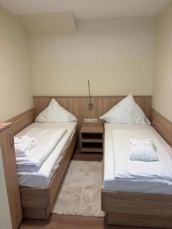 Postel nebo postele na pokoji v ubytování Ringhotel Fährhaus