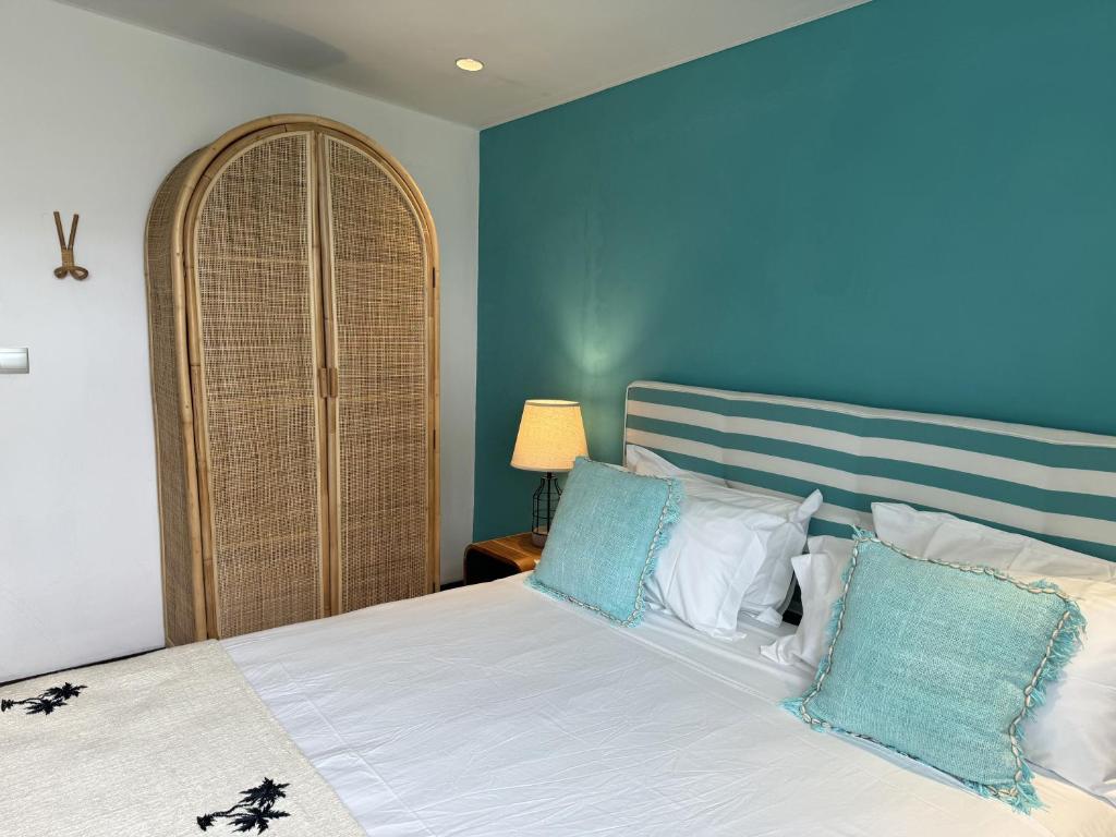 Postel nebo postele na pokoji v ubytování Blue Ocean Suites & Apartments