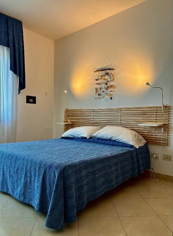 Postel nebo postele na pokoji v ubytování Hotel Fortuna