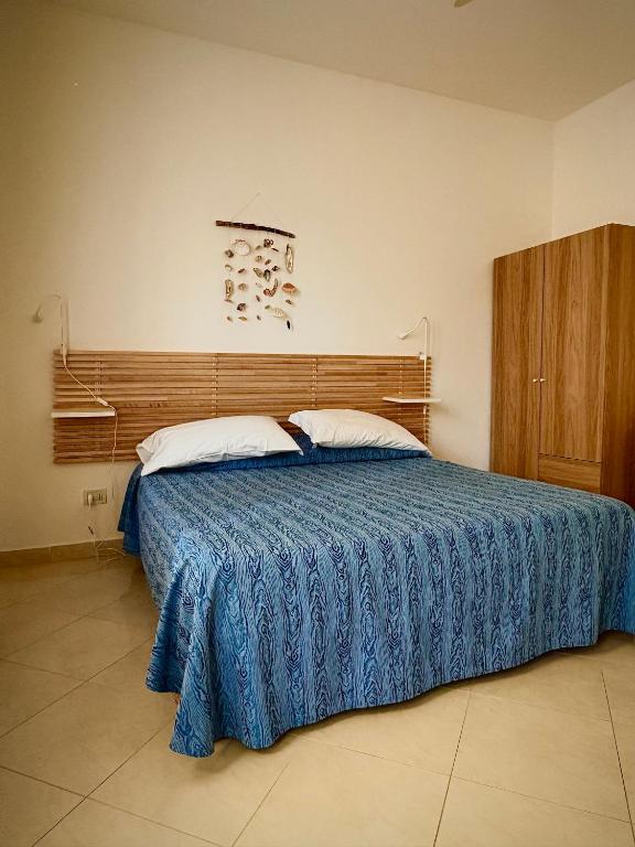 Postel nebo postele na pokoji v ubytování Hotel Fortuna