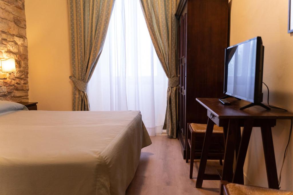 TV a/nebo společenská místnost v ubytování Hotel Belvedere