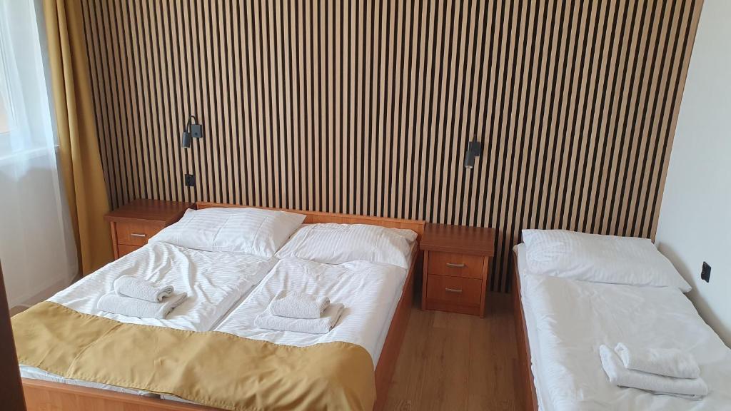 Postel nebo postele na pokoji v ubytování Hotel Felicia