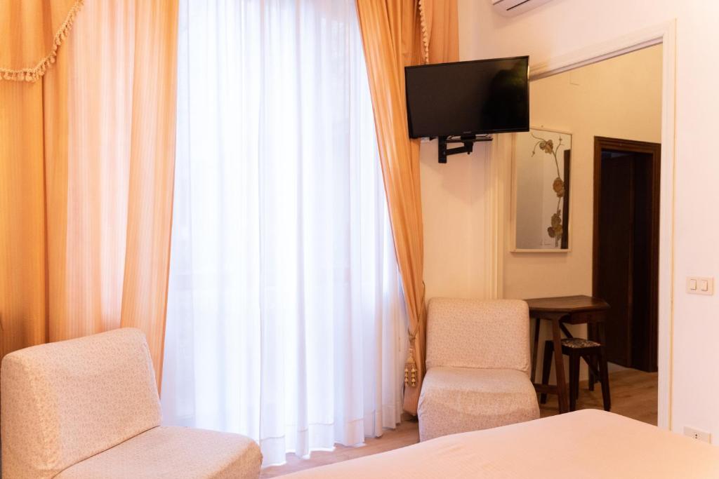 TV a/nebo společenská místnost v ubytování Hotel Belvedere