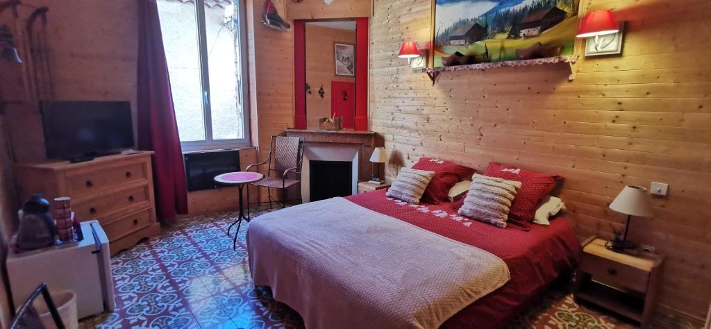 Postel nebo postele na pokoji v ubytování Le Mimosa