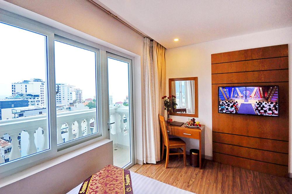 TV a/nebo společenská místnost v ubytování Sunniva Hotel Nha Trang