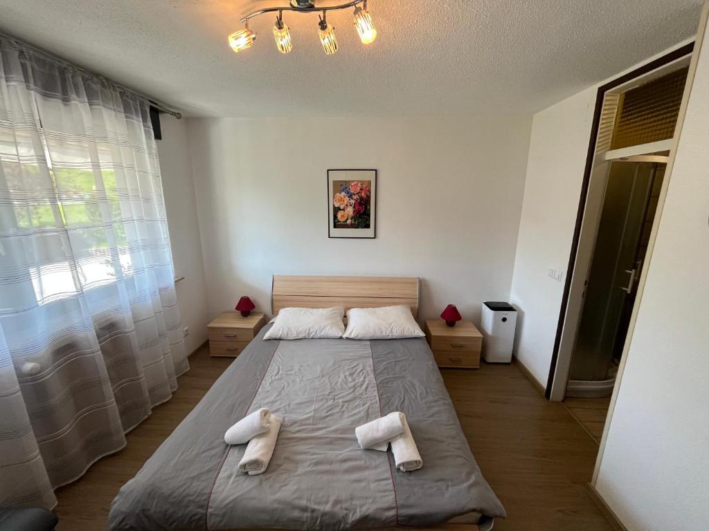 Postel nebo postele na pokoji v ubytování Sara`s Guesthouse Bled